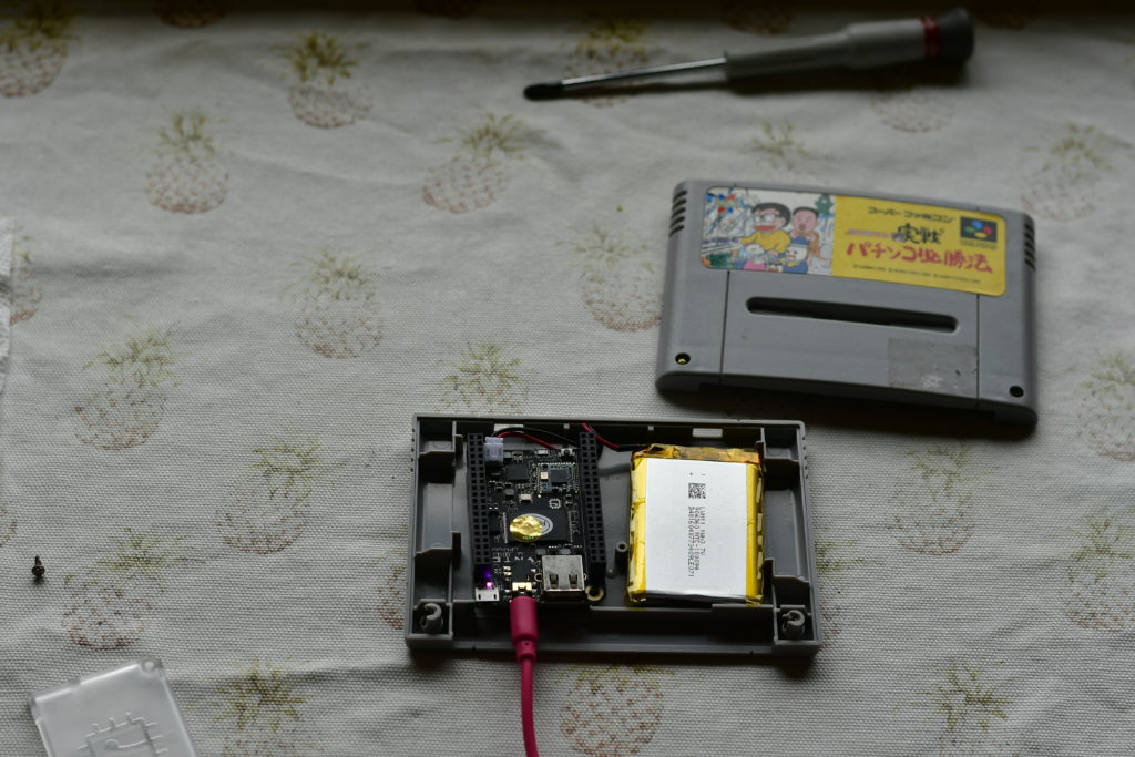 A Chip SBC and battery in a SNES cart.
